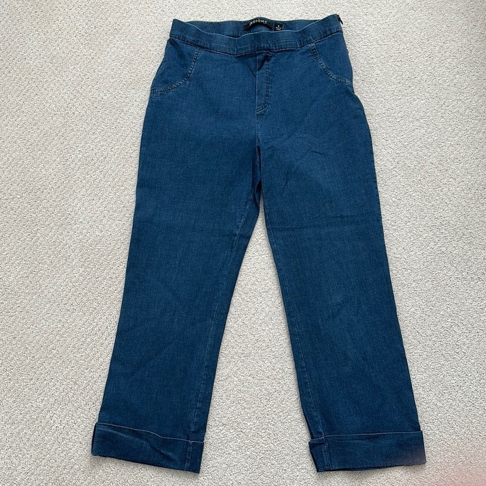 Insight jeans, size 6, medium washed out blue with 2 open back pockets
